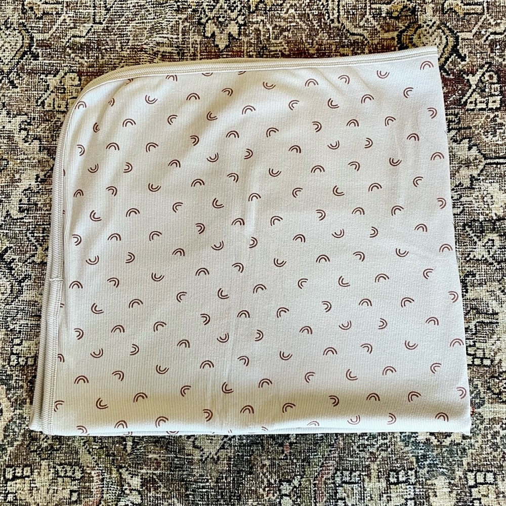 Quincy Mae Ribbed Organic Swaddle Blanket in Taupe/ Rust Rainbow Print